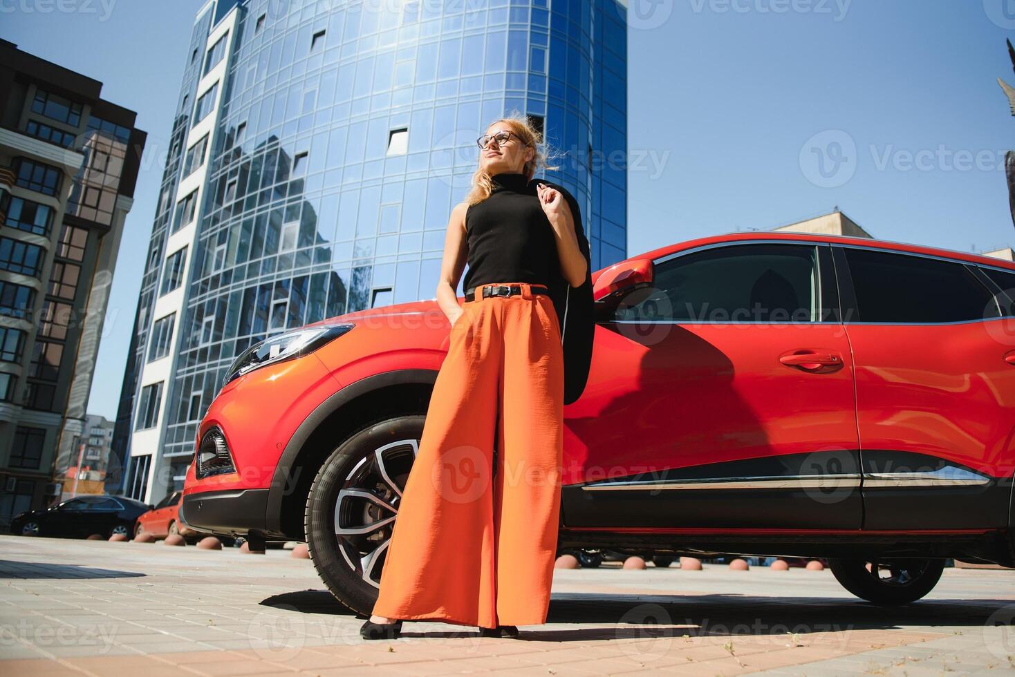 young businesswoman with a car photo