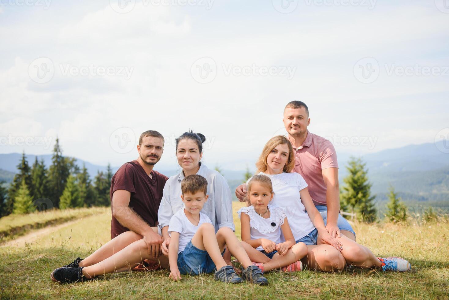 Young family with child resting on a mountain. vacation in the national park photo