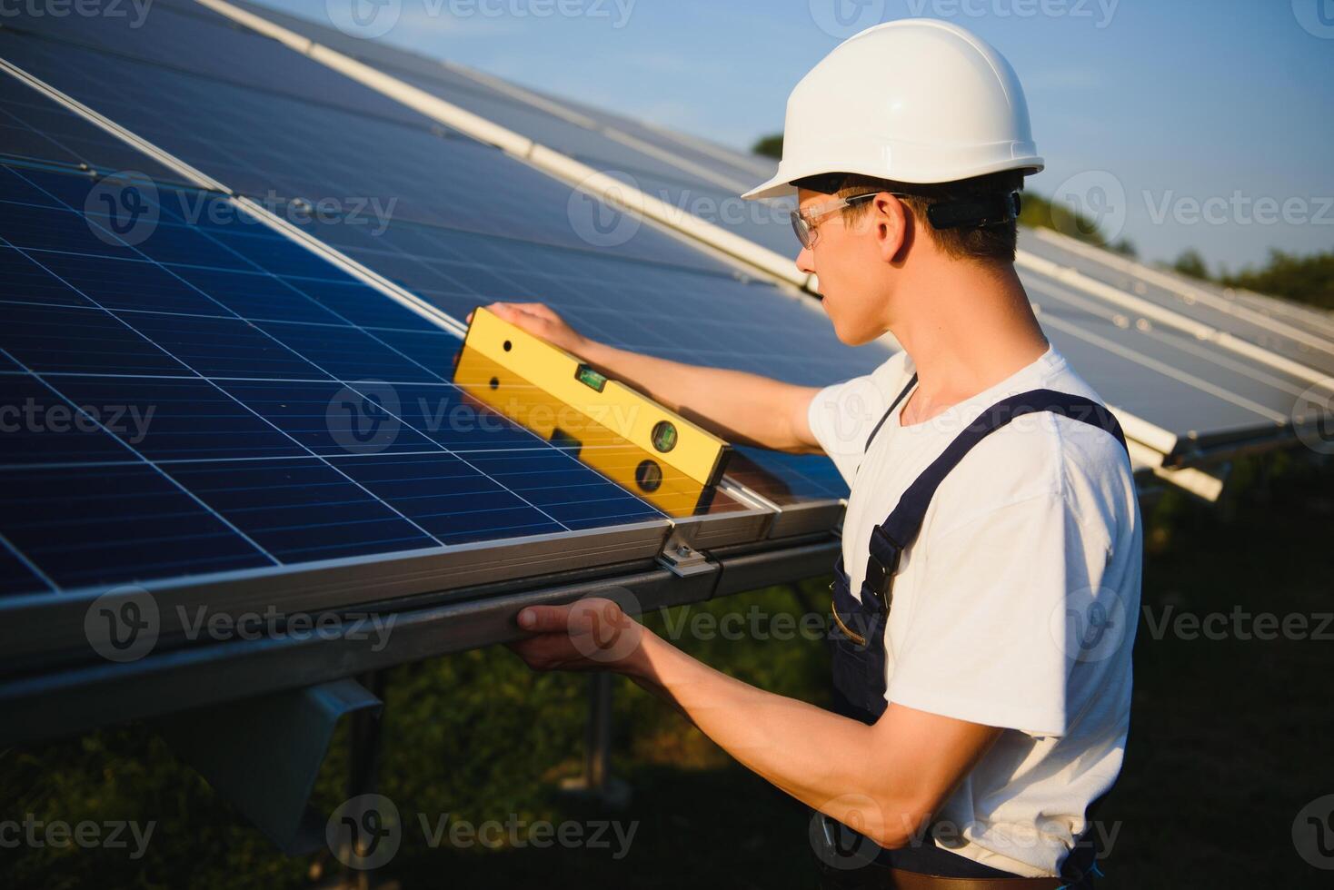 Renewable energy and solar power concept, worker or Electrical engineers are checking and training installing photovoltaic plant in solar power station alternative energy from nature photo