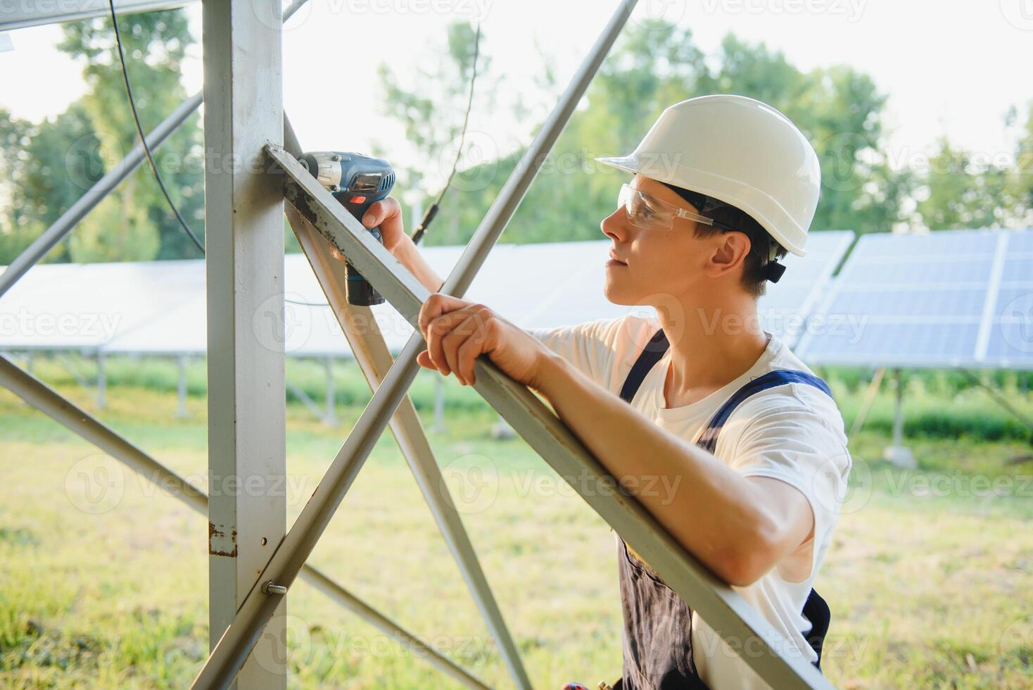 Renewable energy and solar power concept, worker or Electrical engineers are checking and training installing photovoltaic plant in solar power station alternative energy from nature photo