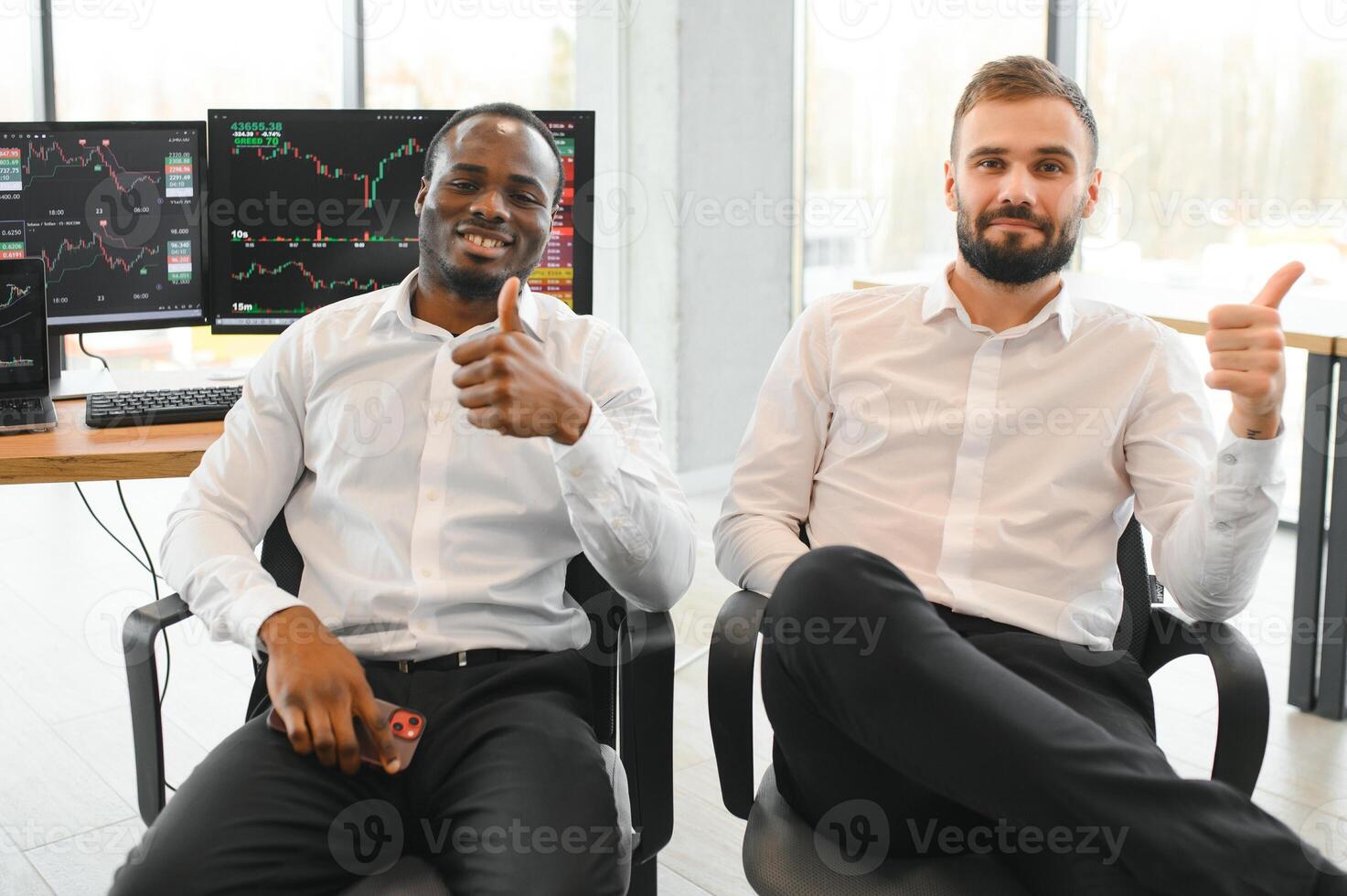 Two diverse crypto traders brokers stock exchange market investors discussing trading charts research reports growth using pc computer looking at screen analyzing invest strategy, financial risks photo