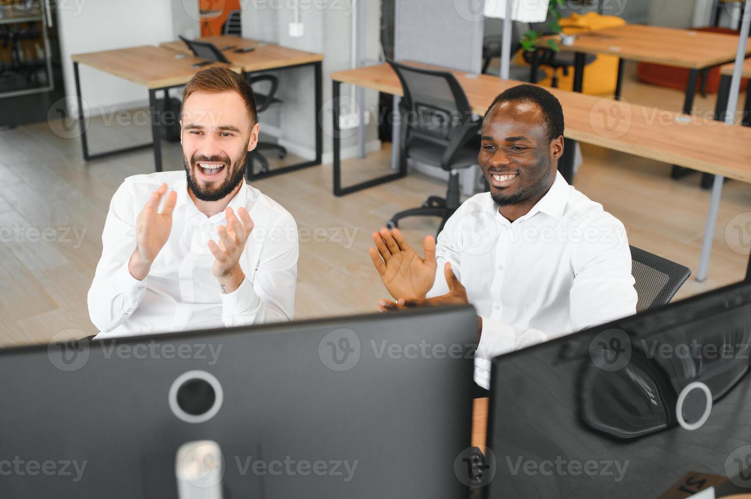 Two stock exchange traders getting profit in trading currency stock. Successful stock exchange showing financial benefit data on monitor screen at highest point of neon light at workplace. Sellable photo