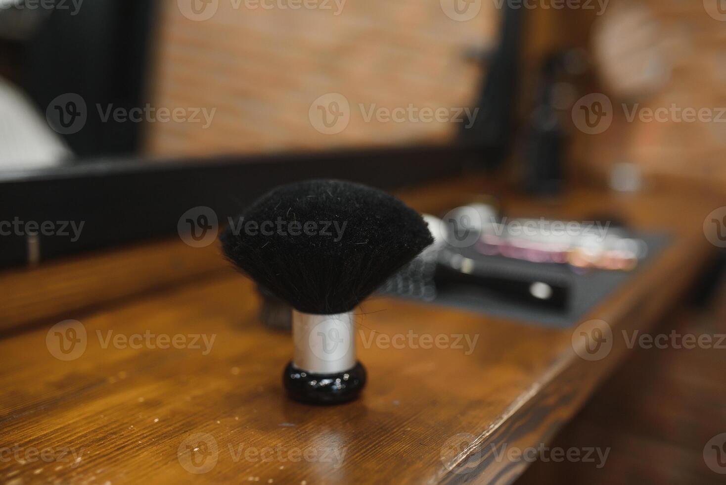 Vintage barber shop tools on old wooden background with copy space. photo