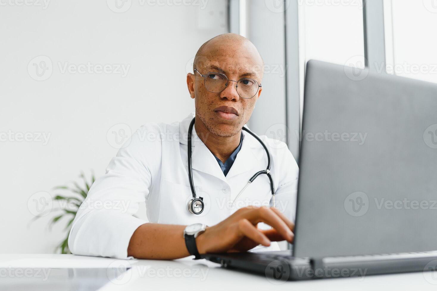 african american doctor in modern office. photo
