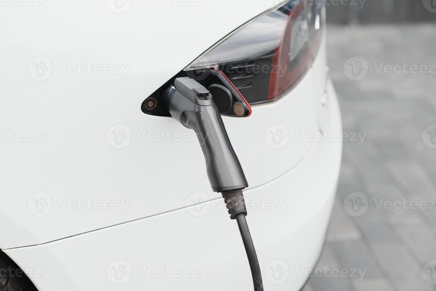 Close up image of the power socket of an electric car, charging photo