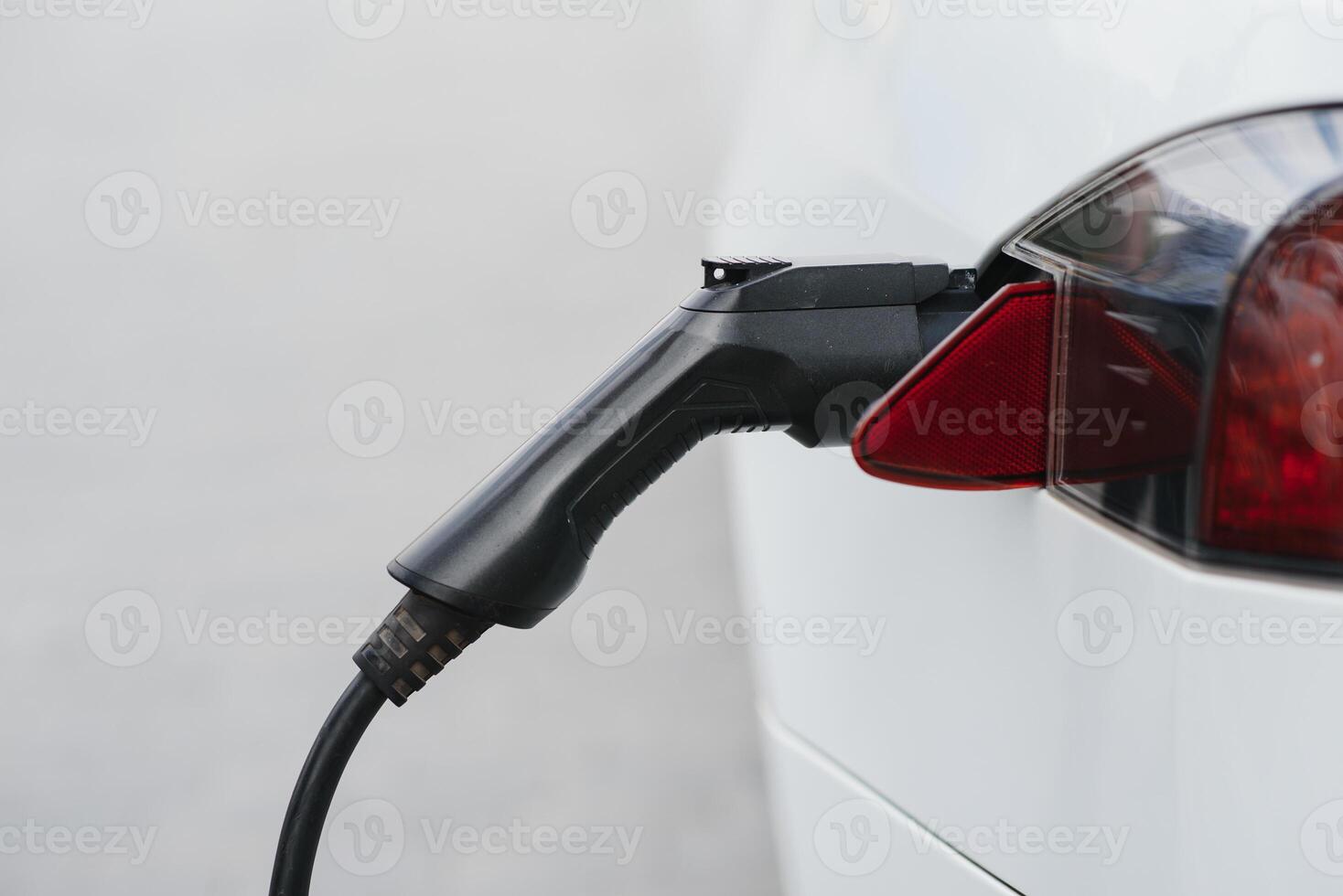 Close up image of the power socket of an electric car, charging photo