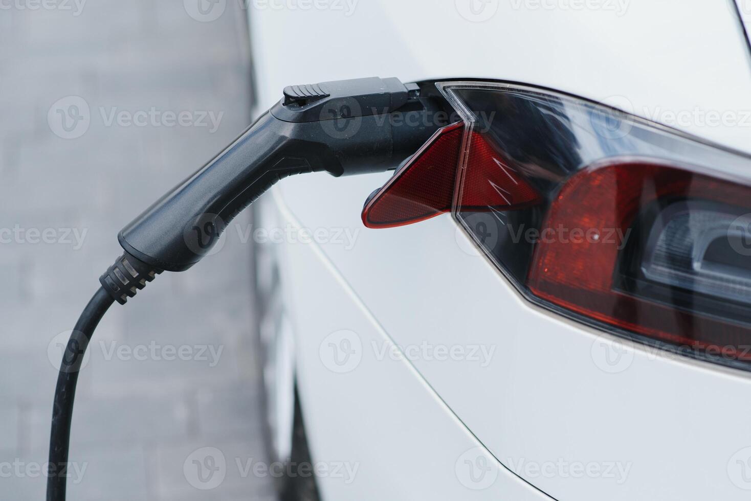 Close up image of the power socket of an electric car, charging photo