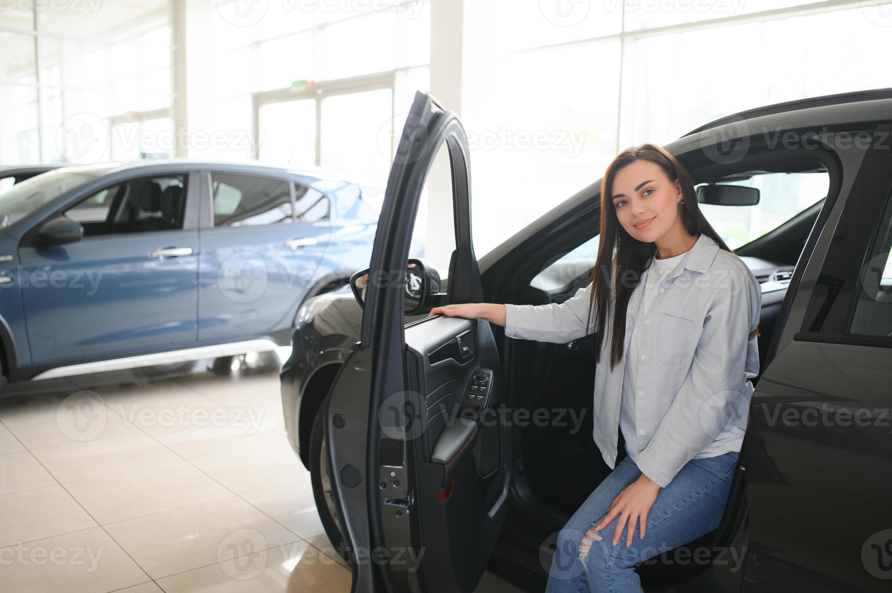Happy friendly woman customer female buyer client chooses auto wants to - Cathy Wants To Buy A New Watch Online