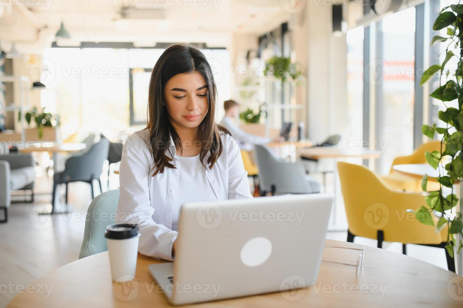 Smiling girl student study online with skype teacher happy young woman learn language listen lecture watch webinar write notes look at laptop sit in cafe distant education 46758276 Stock Photo at Vect...