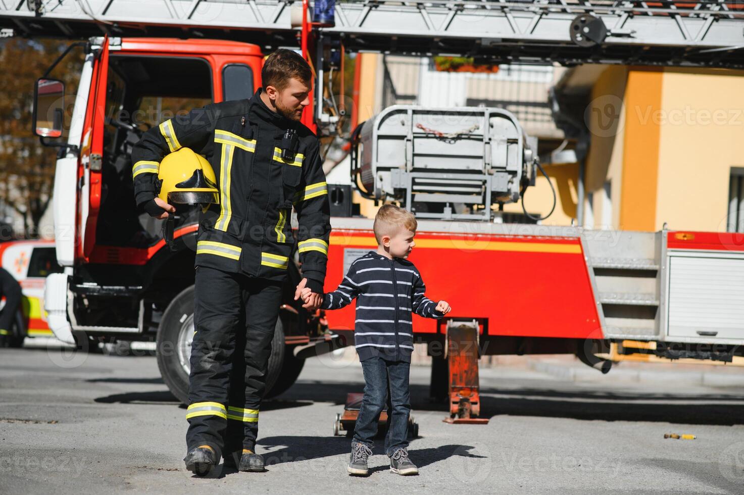 Protect people from dangerous with brave heart.Hero in fireman with uniform safe children from burn smoke photo