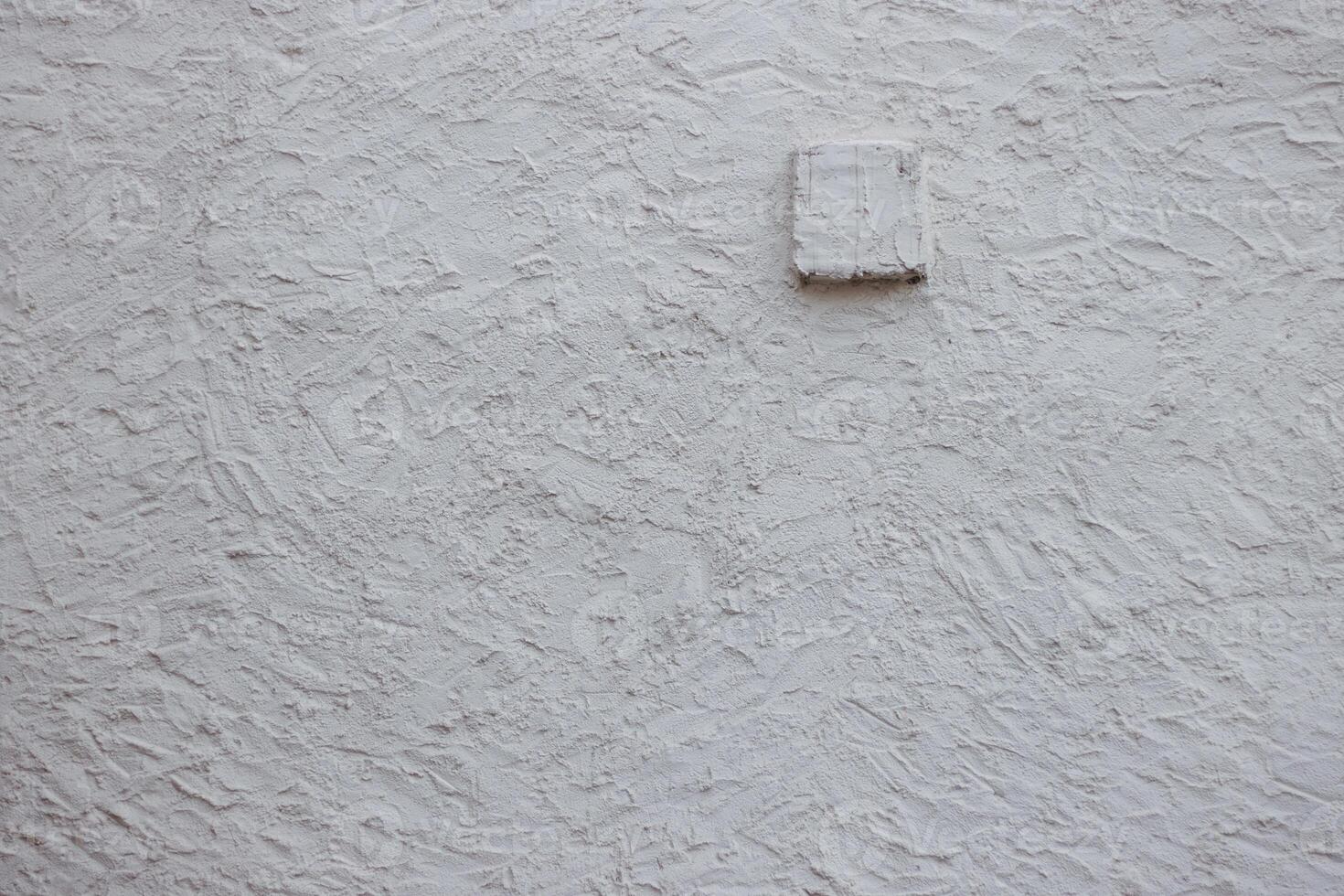 Wall fragment with scratches and cracks. Concrete cement wall texture with three dimensional elements. Modern design. Retro grunge style. Copy space. Wallpaper, banner, textures, background photo