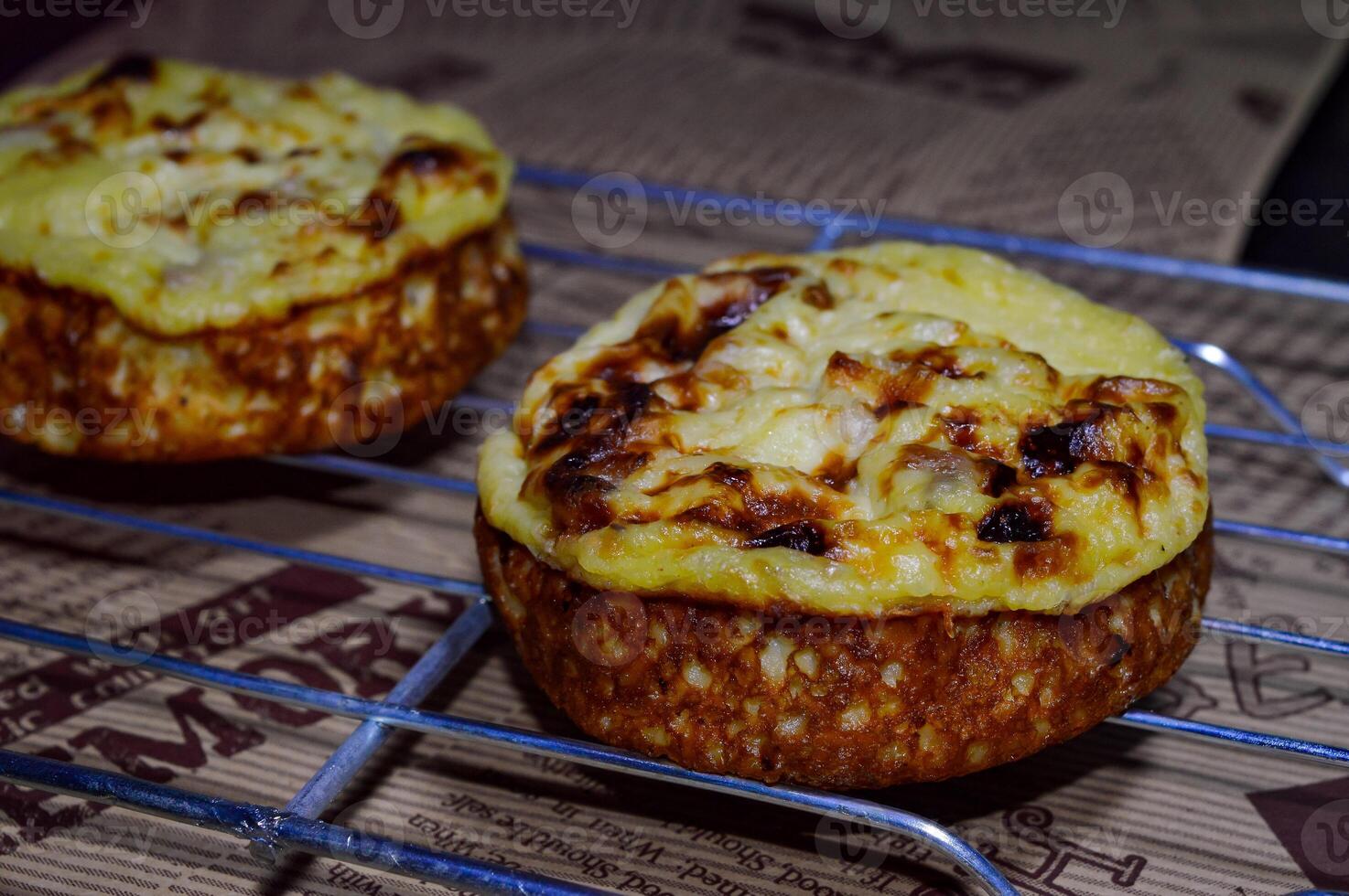 Baked mud cakes are wet cakes or traditional Indonesian market snacks, their soft texture and puffy inside when cooked and their sweet taste. photo