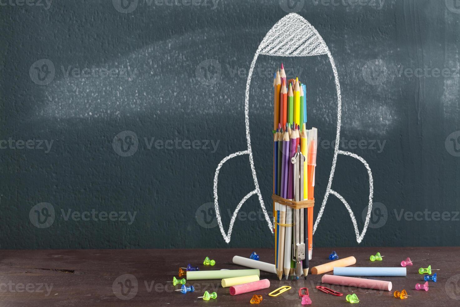 Rocket Sketch On Blackboard photo