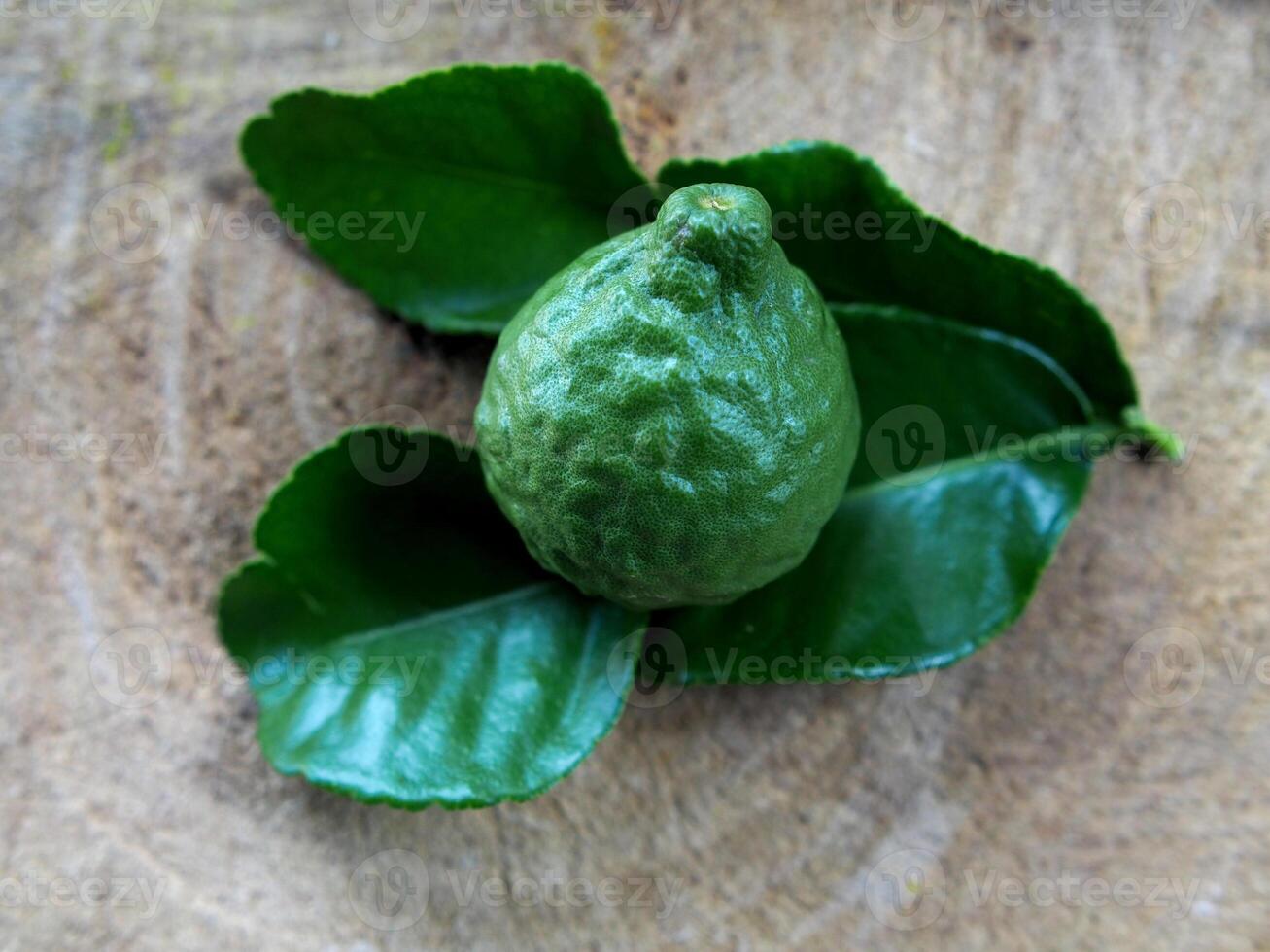 kaffir lime green leave spice and aroma oil for spa photo