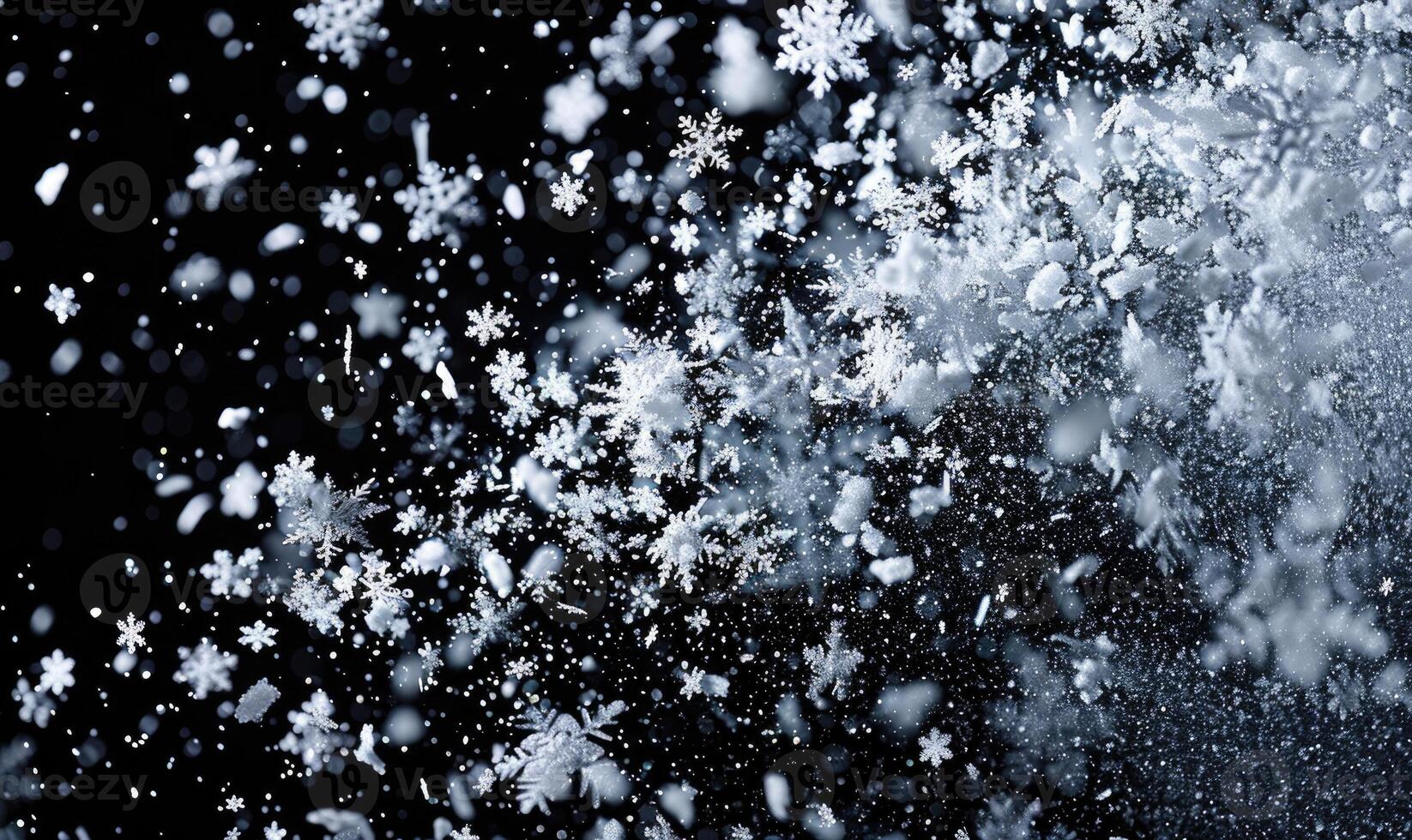 Snow explosion on black background photo