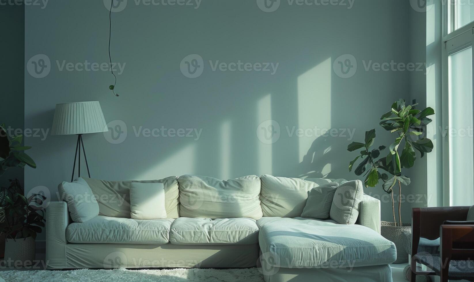 A cozy minimalistic modern interior room with pale gray-blue walls photo