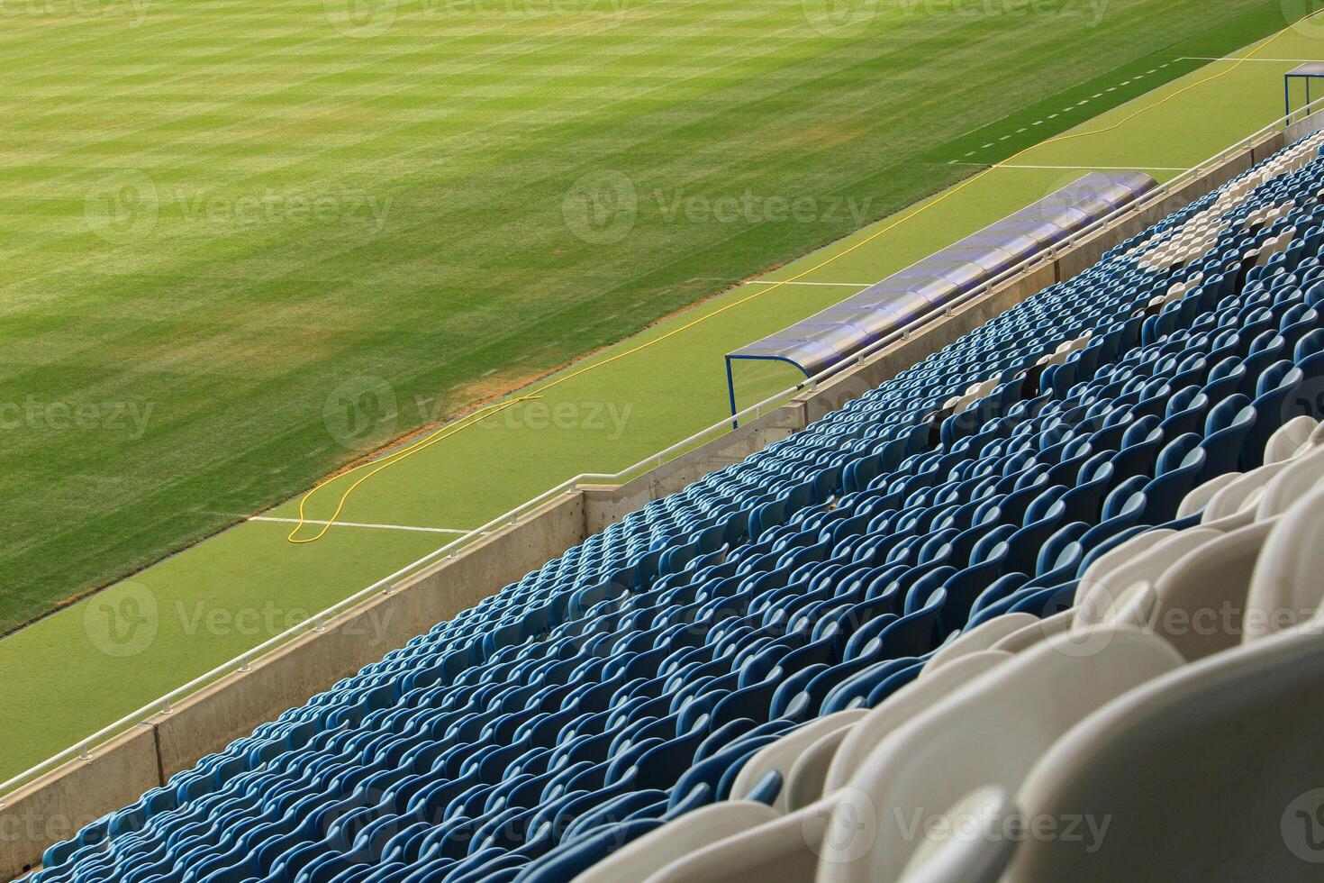 Closed Sport Stadium With Empty Grandstands photo