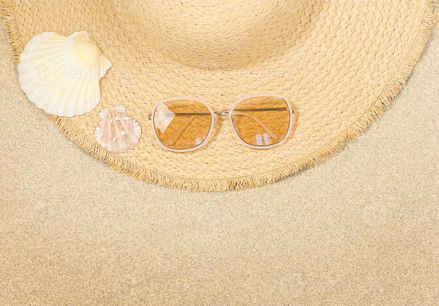 Straw hat on the sand, summer concept, Copy space photo