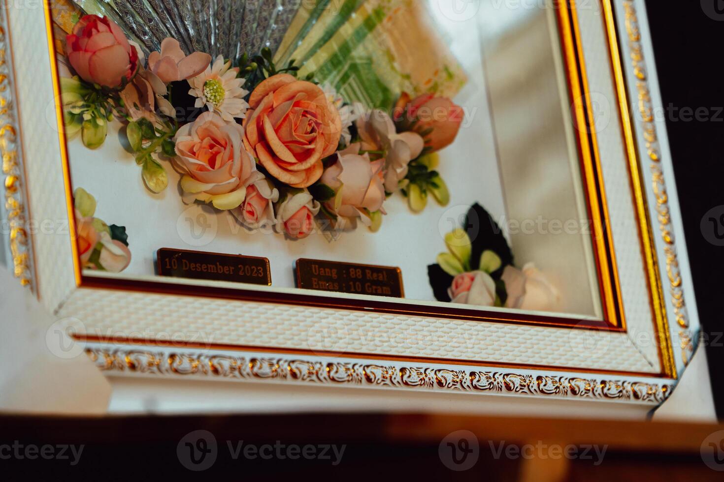 Wedding gift box with Indonesian culture. The dowry is in the form of banknotes that are beautifully and attractively decorated in white and gold frames photo