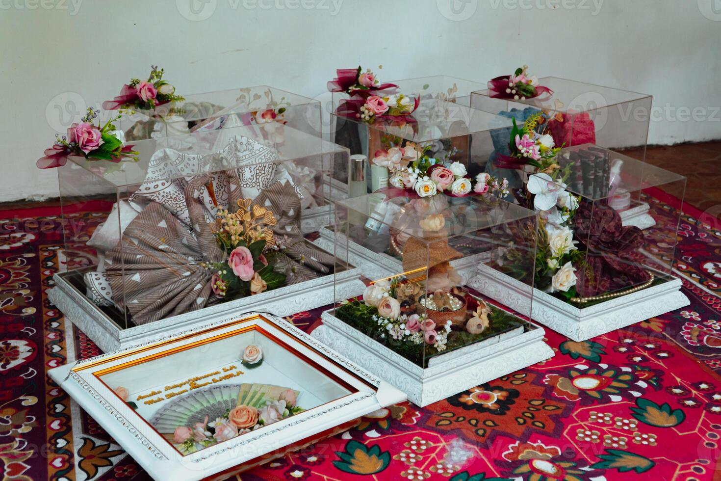 The offering box contains a wedding dowry with Indonesian culture. The dowry given by the groom to the bride when she is about to get married, contains beautifully and attractively decorated items photo