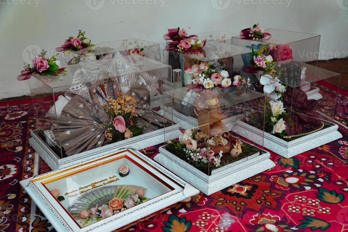 The offering box contains a wedding dowry with Indonesian culture. The dowry given by the groom to the bride when she is about to get married, contains beautifully and attractively decorated items photo
