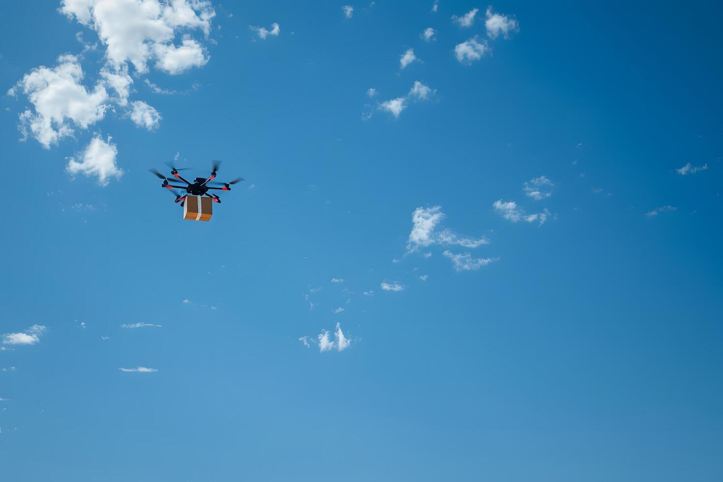 Efficient Drone Delivery Against Clear Blue Sky photo