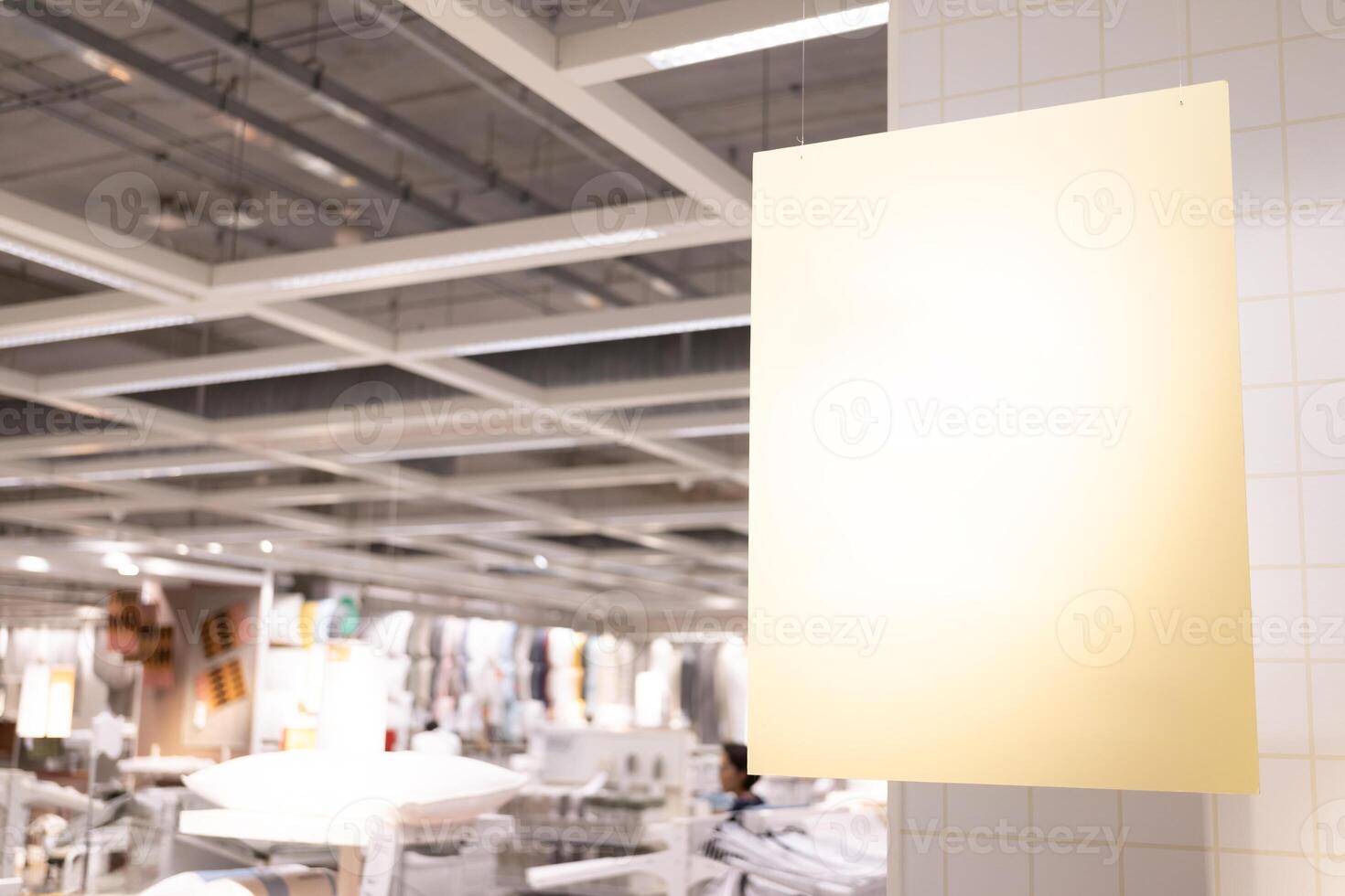 Empty sign inside shopping mall. mock up advertise display frame setting over the shopping department store for shopping. copy space. photo