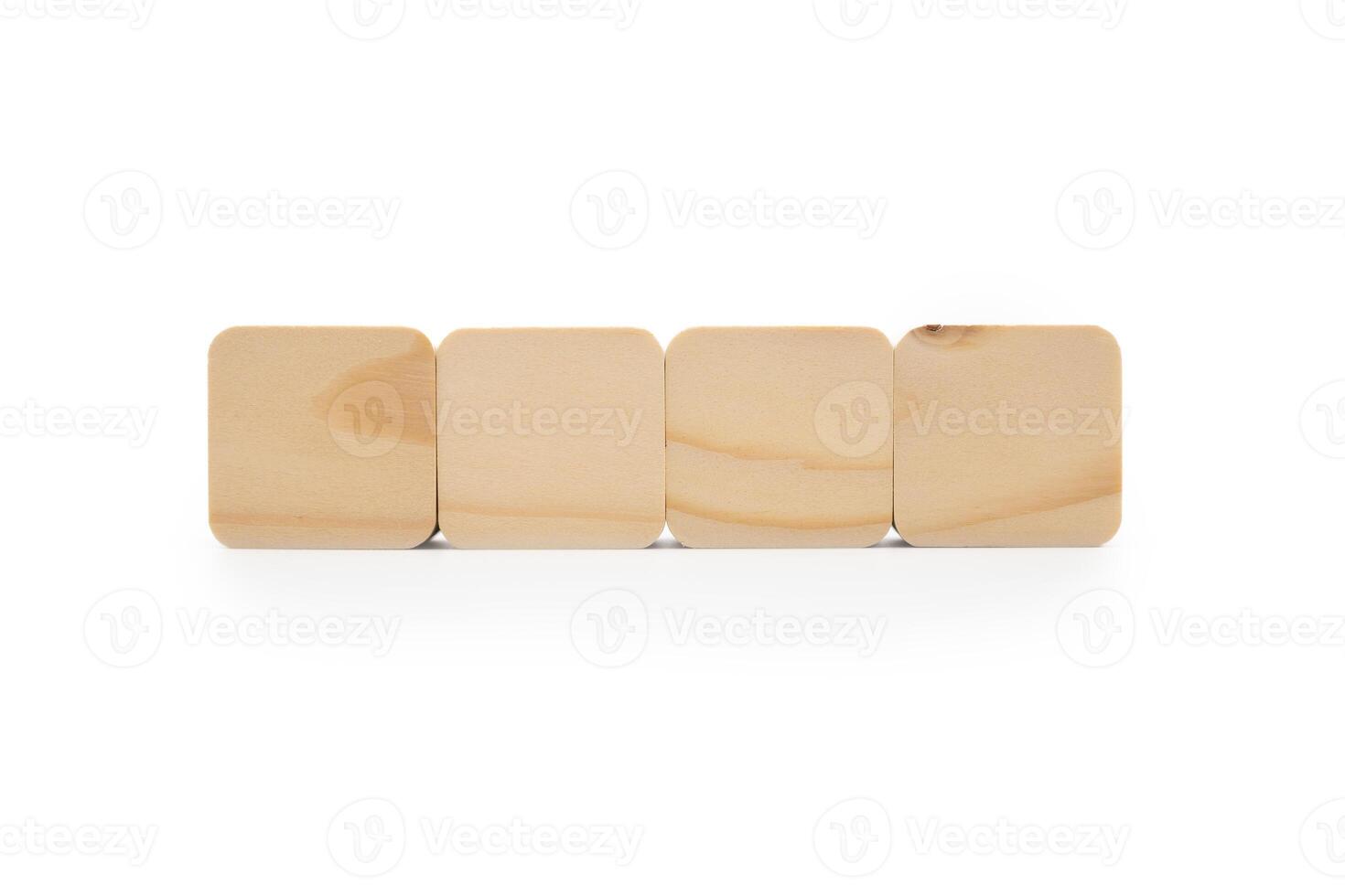 Four Wooden cubes in row. It is isolated on a white background with clipping path. Wooden toy blocks. empty copy space for message word. photo