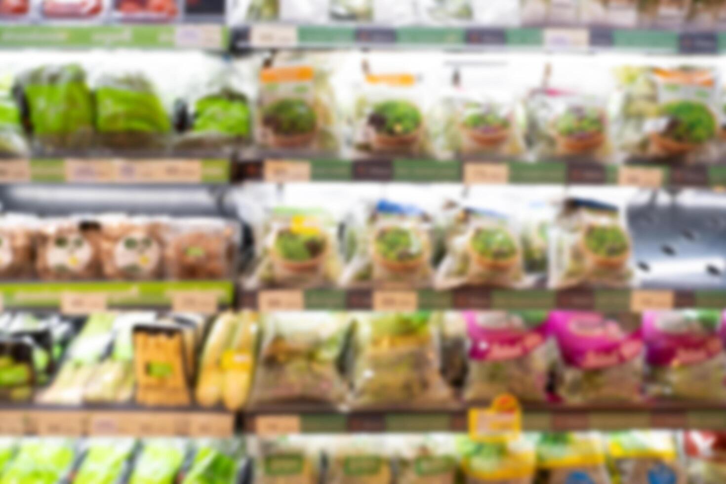 Fruits and vegetable shelf in blur style background. Abstract blur Supermarket background. photo