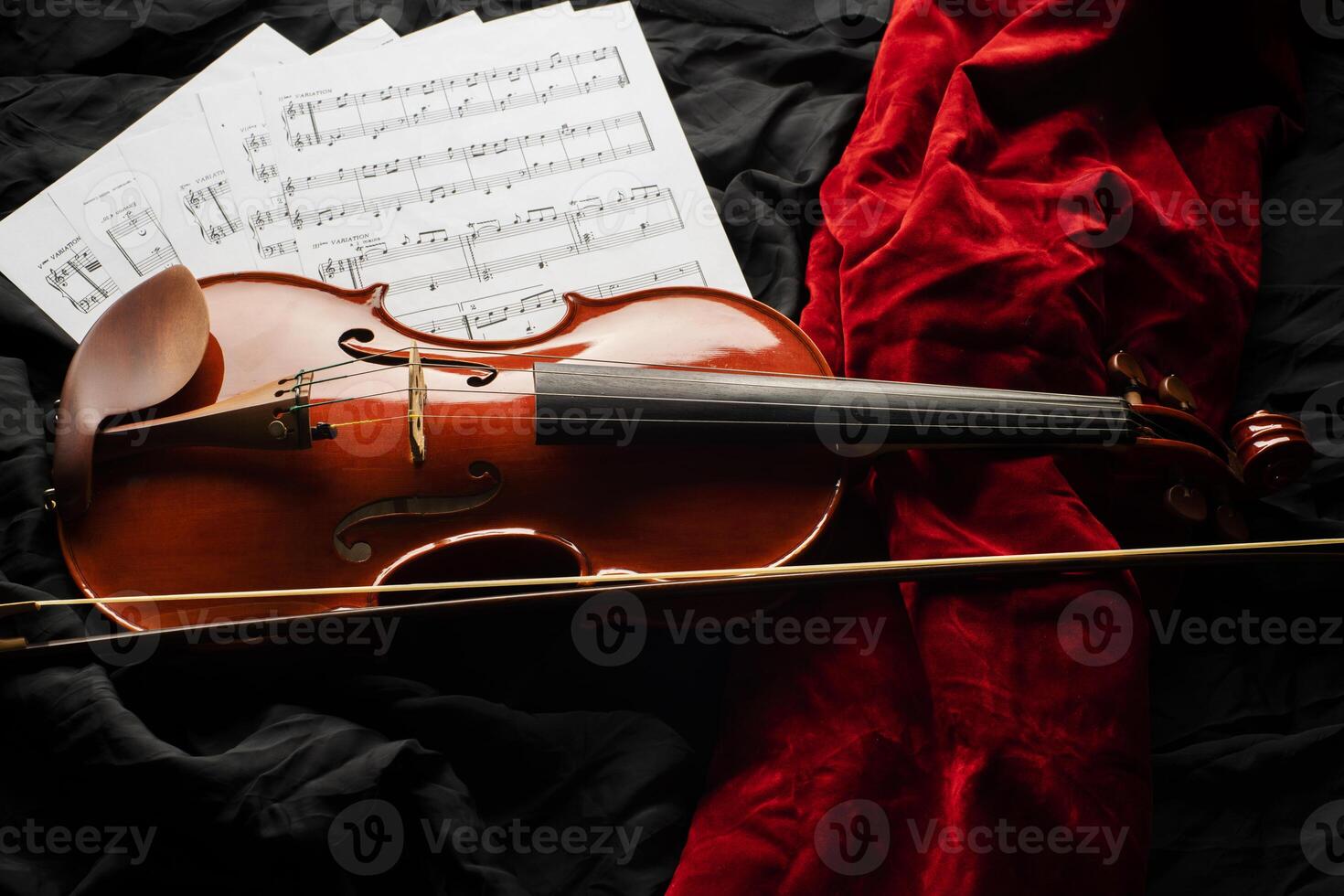 Violin on a black and red background photo