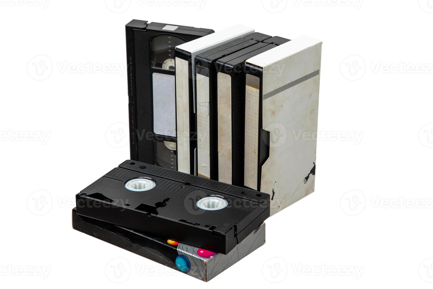 Pile of VHS cassettes. Vintage media. Isolate on a white back. photo