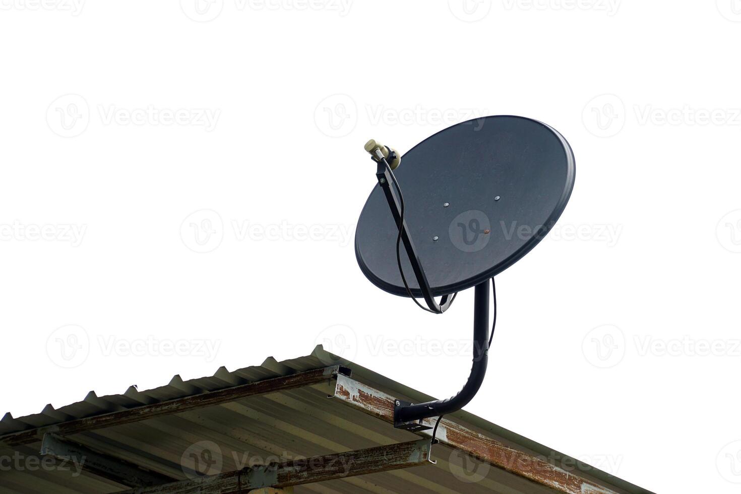 Satellite dish installed on the roof of the house for receiving television waves. Soft and selective focus. photo