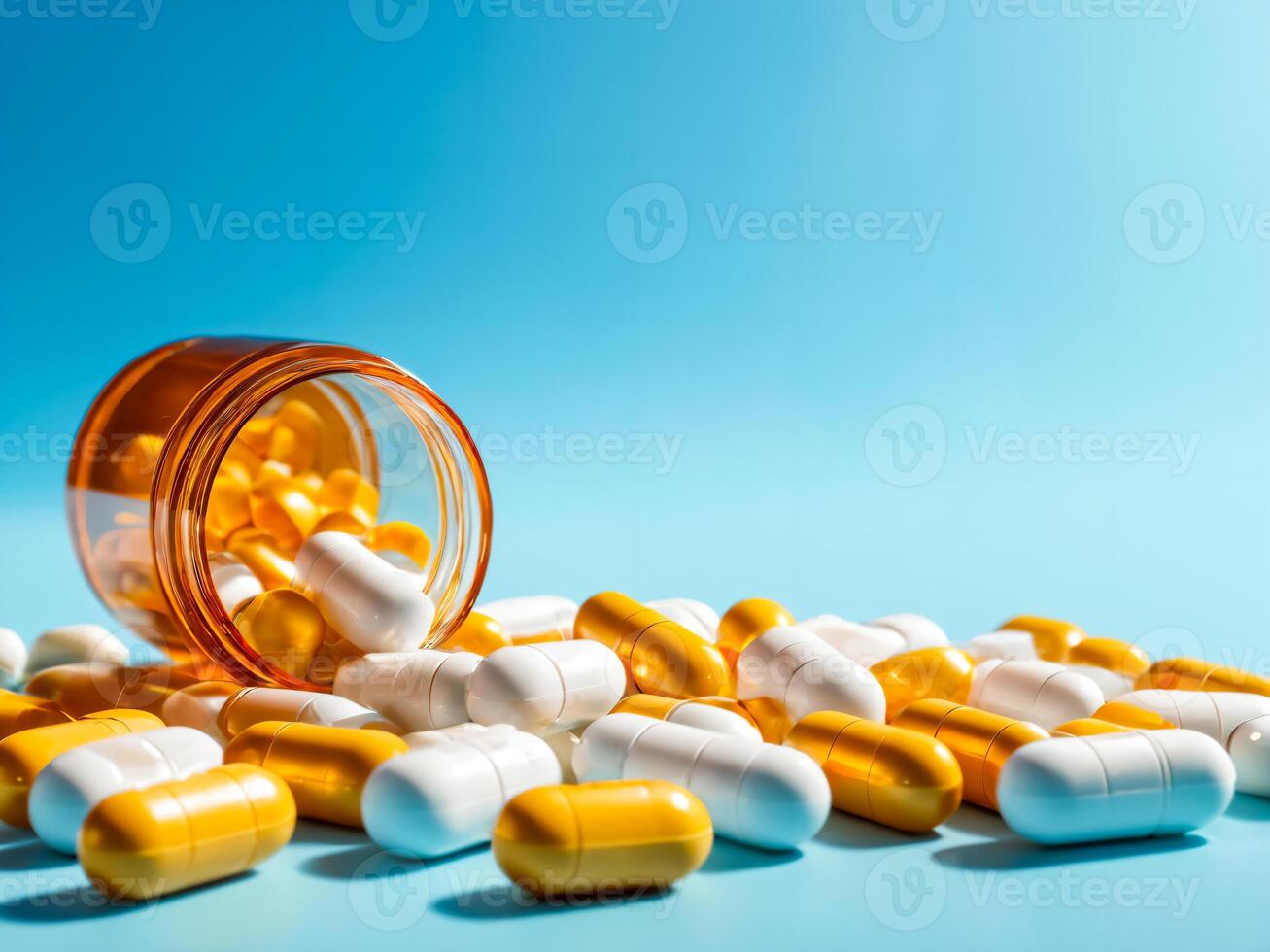 Scattered Yellow and White Capsules with Open Bottle photo