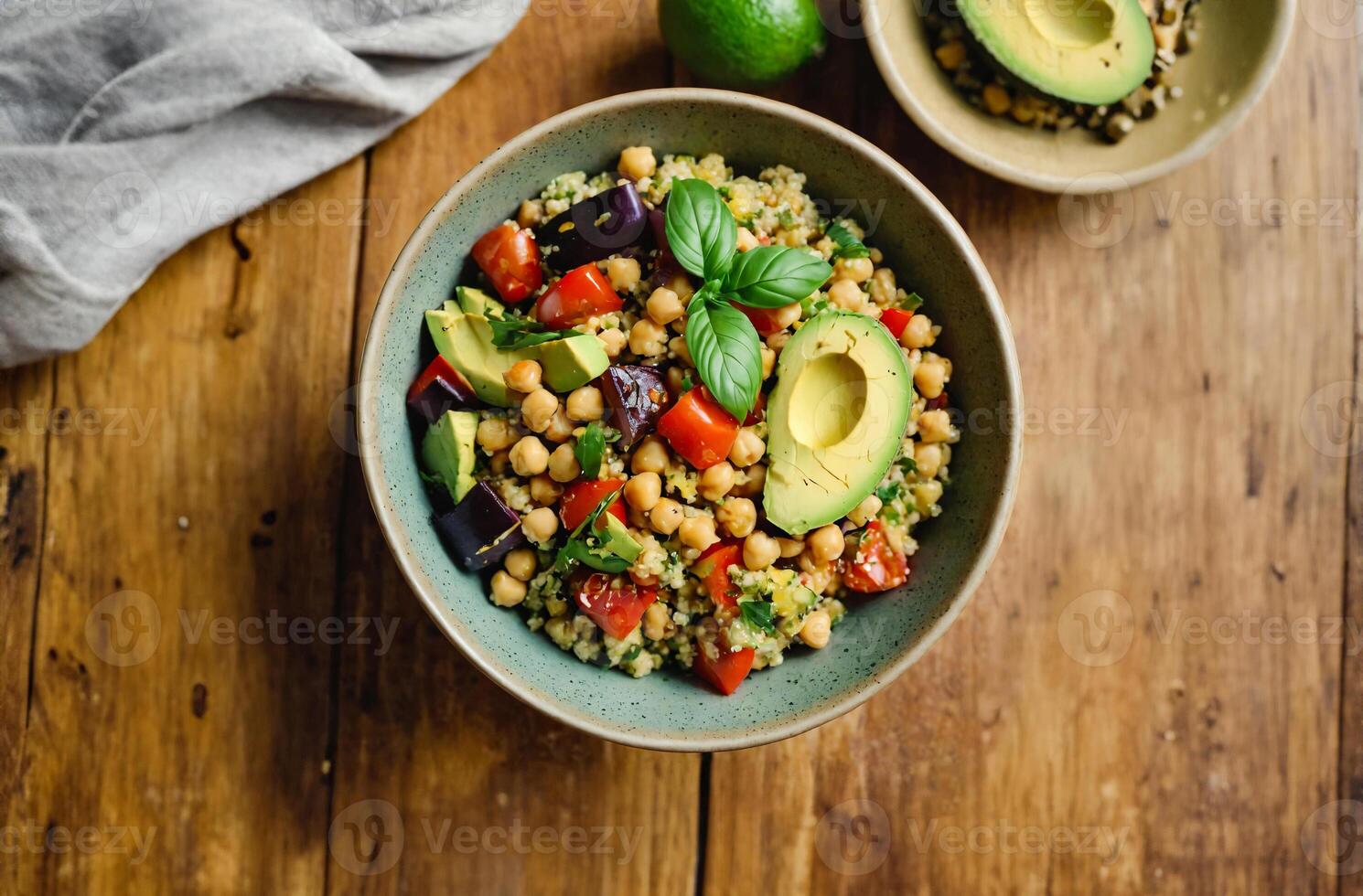 Healthy Avocado Chickpea Salad on Wooden Table photo