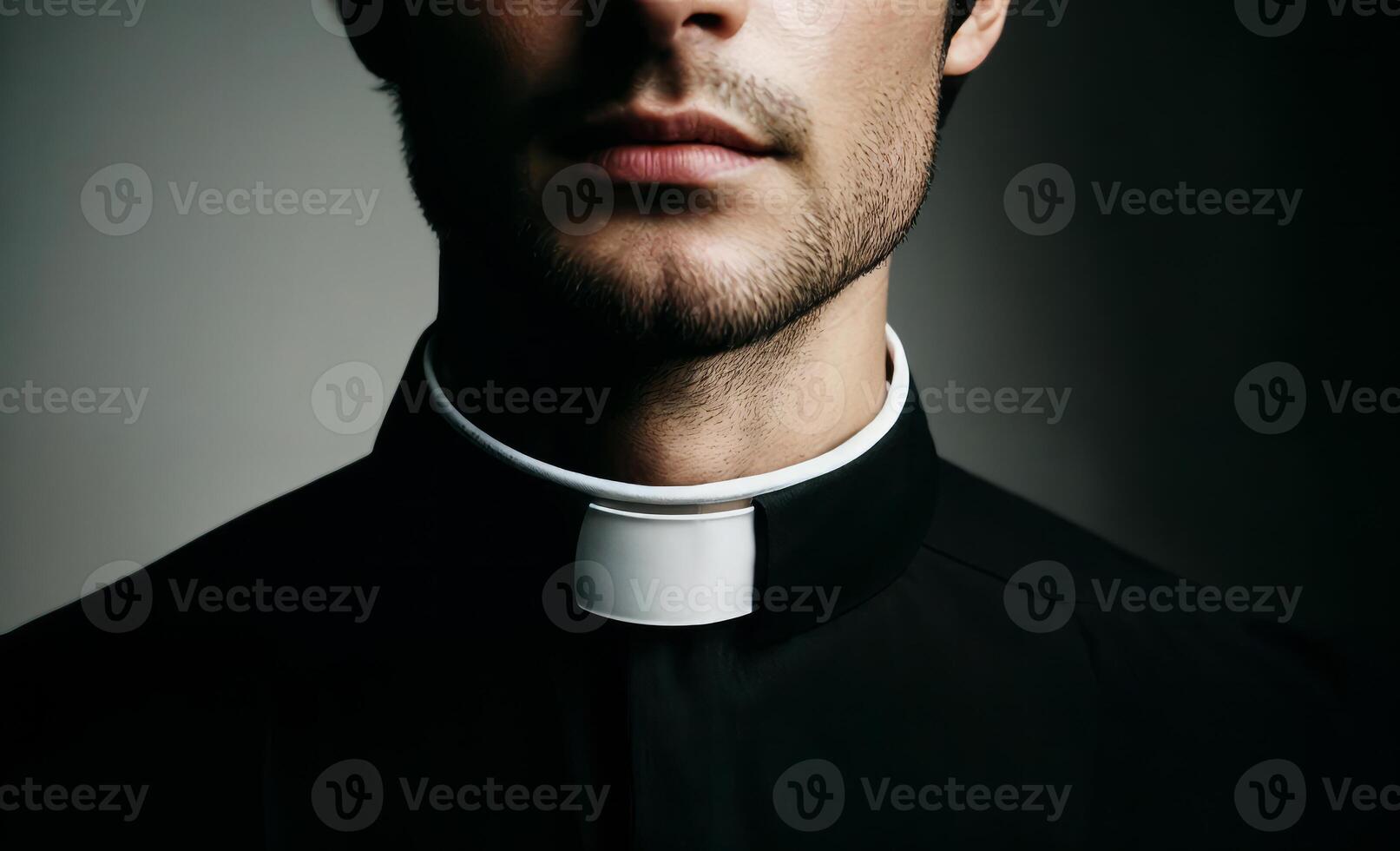 Young Male Priest Wearing Clerical Collar photo