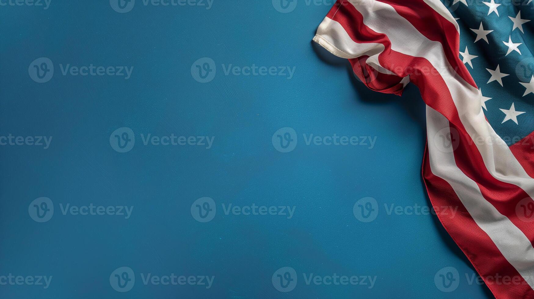 Folded American Flag on Blue Background, Memorial Day, Realistic Fabric photo