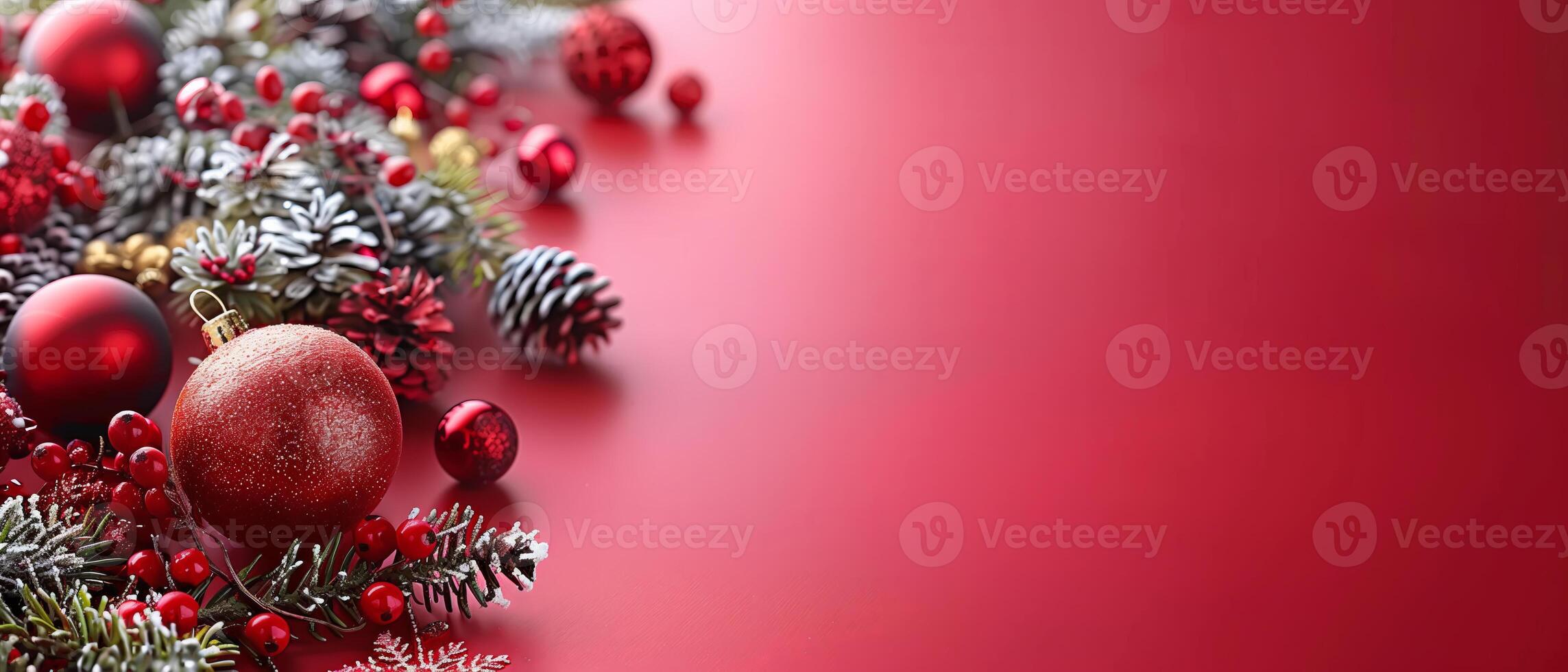 Assorted christmas decorations on red surface, holiday banner with copy space photo