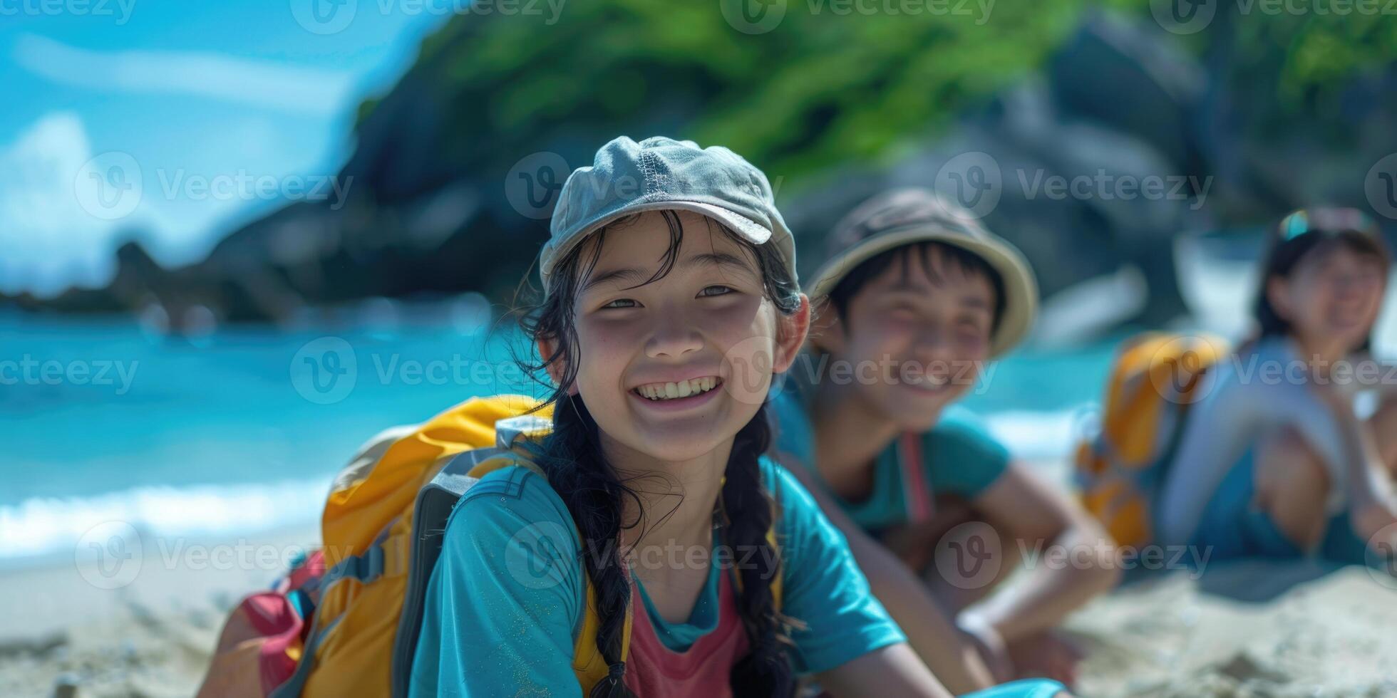 portrait of happy Japanese teens relaxing on Okinawa beach. photo