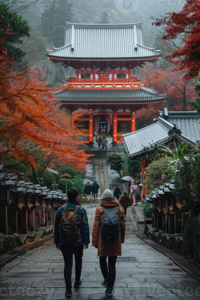 couple traveling in Japan, visiting temple. photo