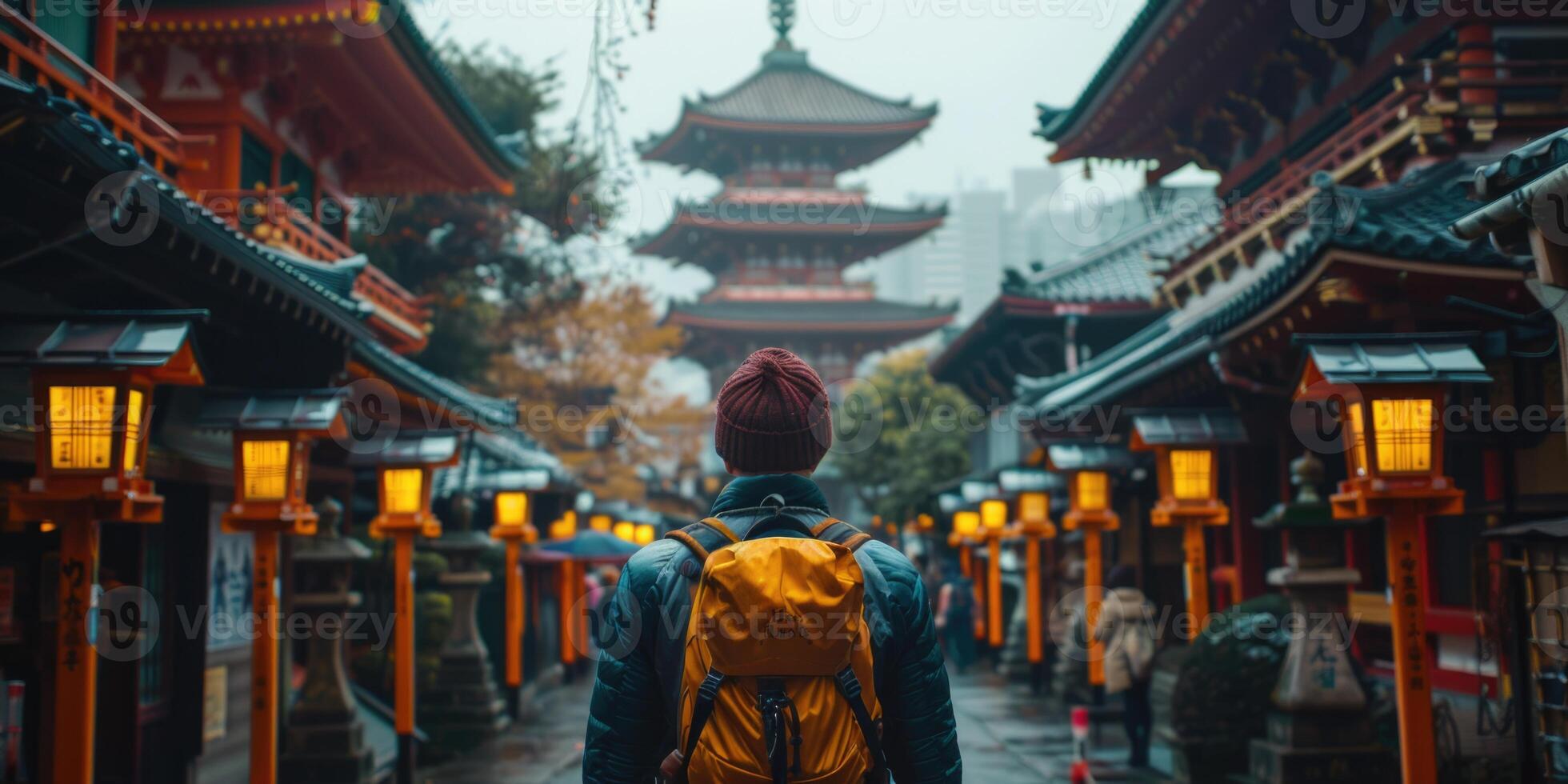 man traveling in traditional japanese city Kyoto in momiji season. photo