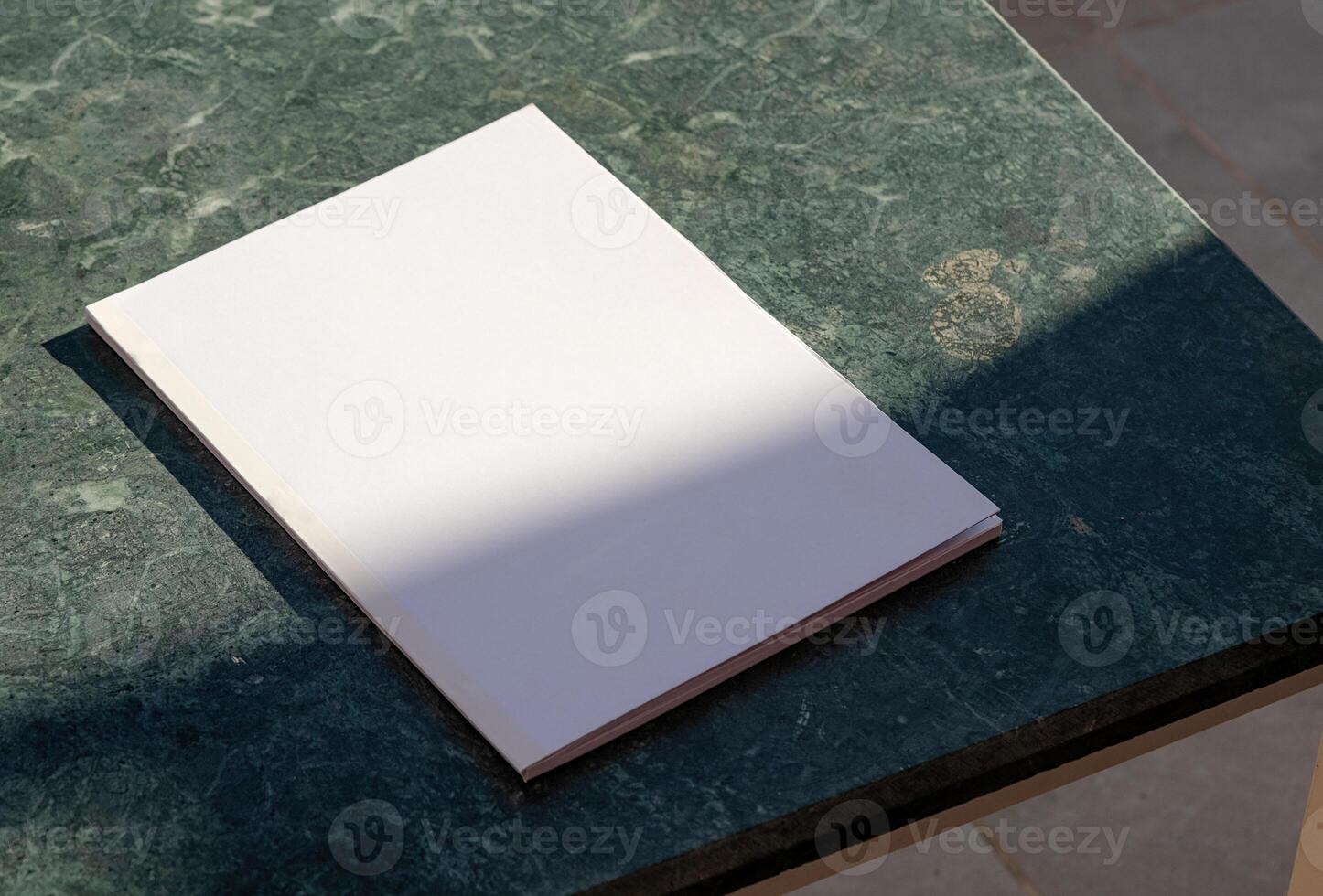 blank magazine mockup on green marble stone coffee table , shadow overlay photo