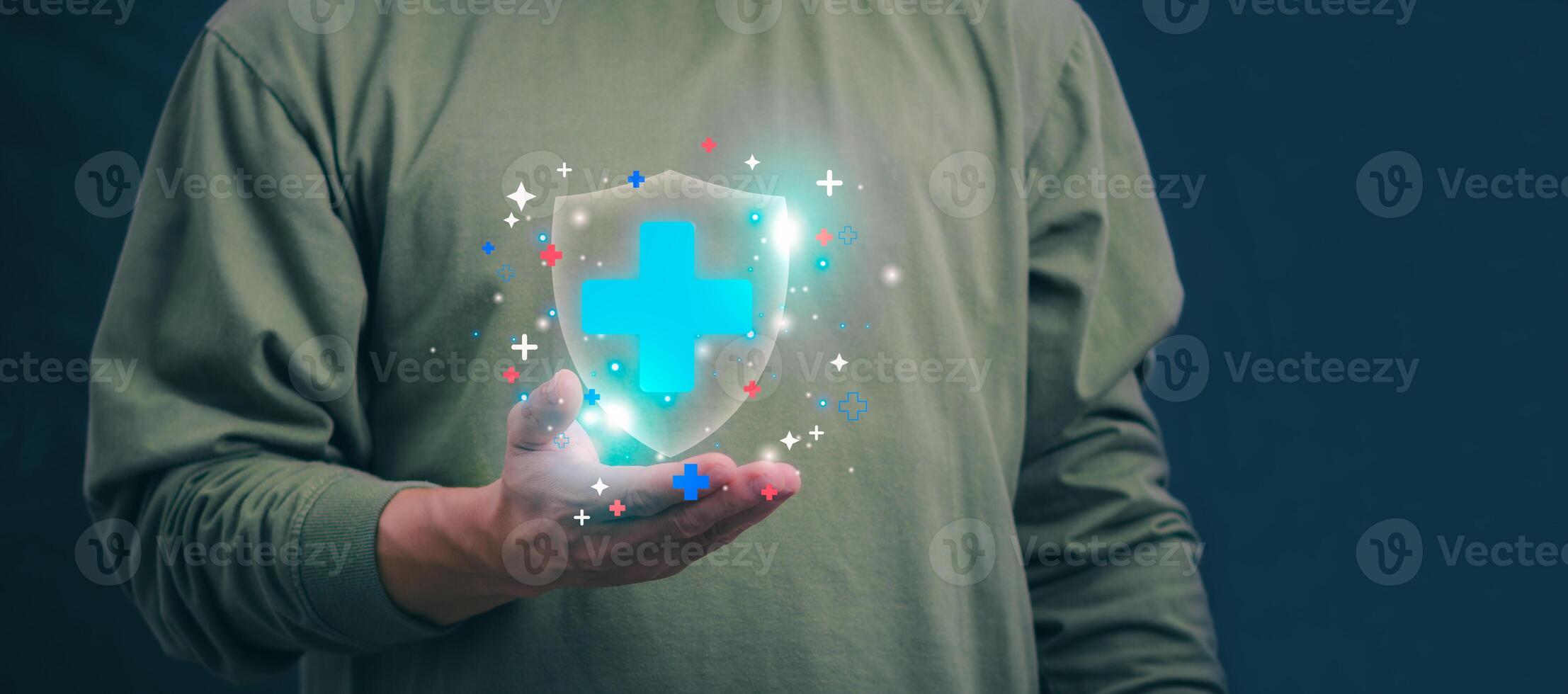 Businessman showing a symbol or icon related to health insurance or healthcare. Concepts for developing and accessing care anywhere, anytime, doing business related to the hospital business photo