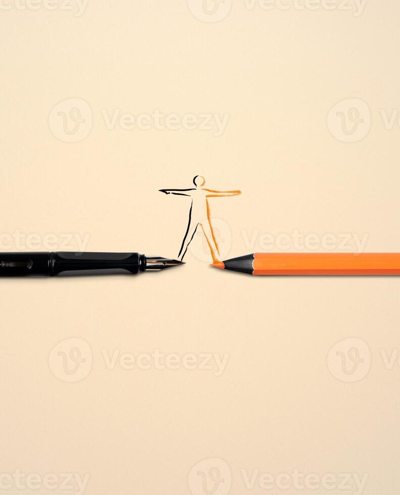 Work Life Balance Copceptual Photo, top view of a Vulture Business Pen and an Orange Colored Pencil, Connected the lines by Drawing a Human Body Shape photo
