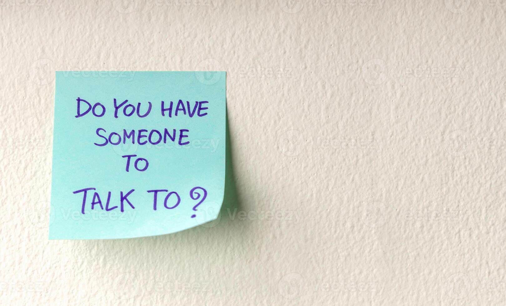 Mind, Mental Health and Encouragement Concepts. a Sticky Note with the Meaning of Care was taped on the white Wall photo