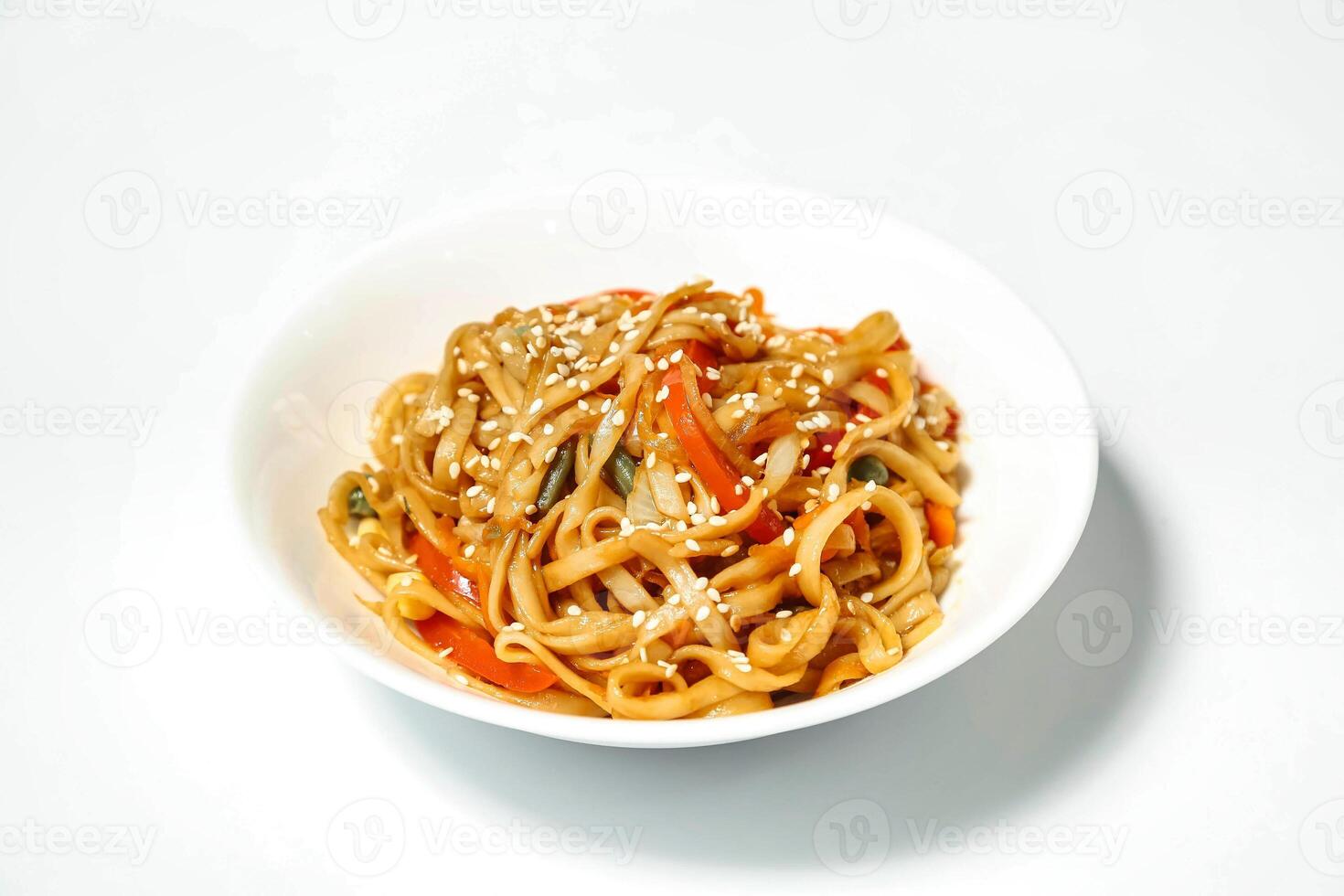White Bowl Filled With Noodles and Vegetables photo