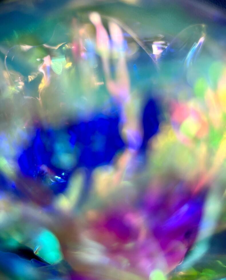 Blur defocus effect colorful plastic hologram shiny effects background photography isolated on vertical ratio wallpaper template backdrop. photo
