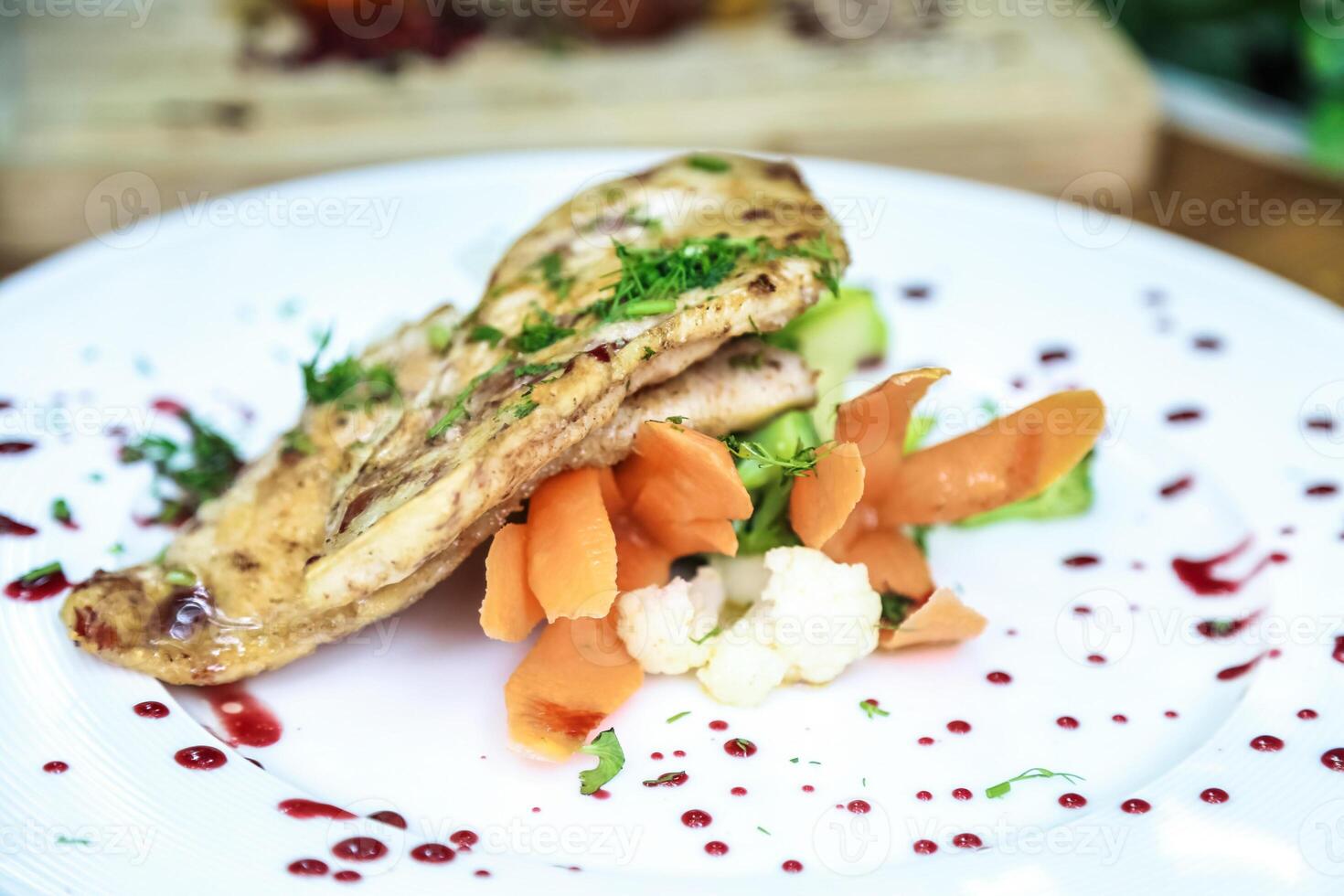 Wholesome White Plate With Savory Meat and Fresh Veggies photo