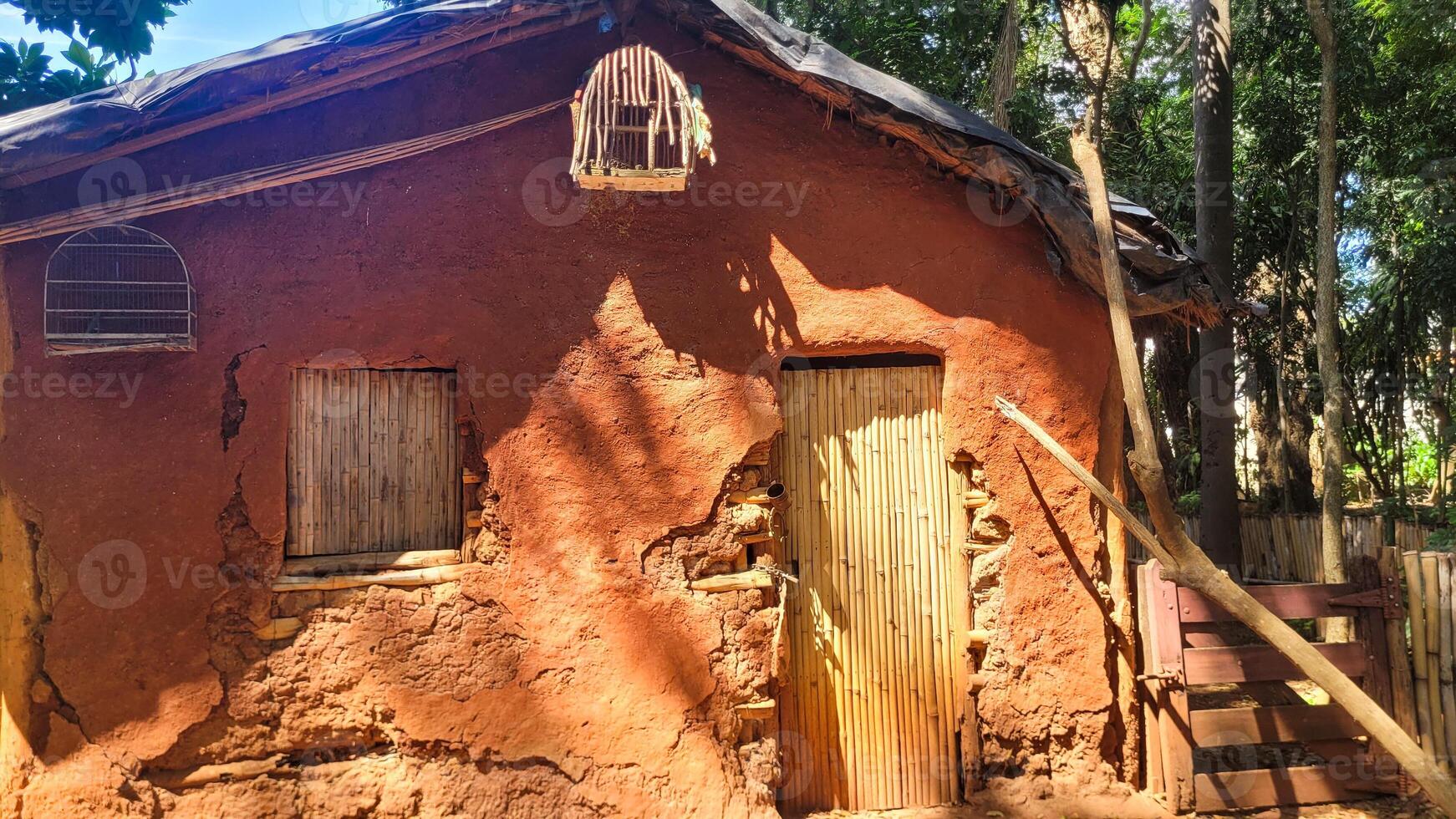 rustic house made of wood and clay photo