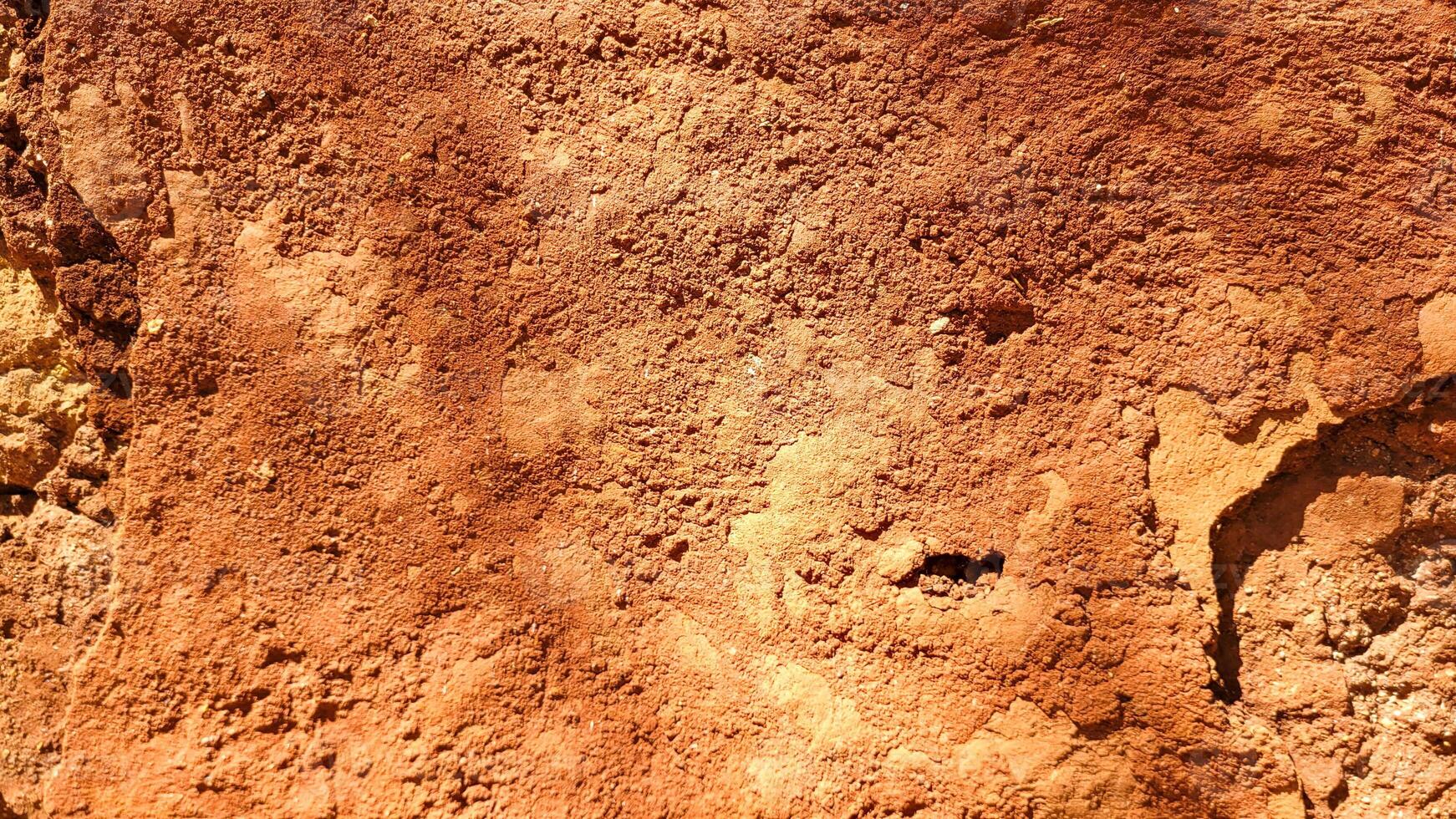 abstract background with rustic orange terracotta texture photo