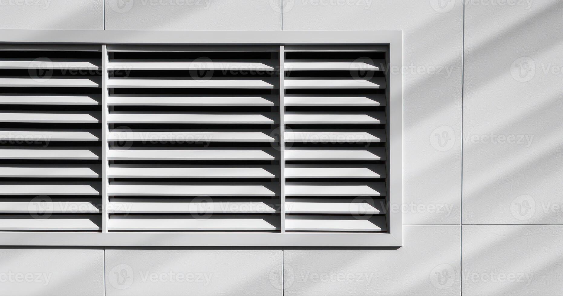 Ventilation Grille On White Facade Of Modern Building. Abstract Composition Of Shadows And Lines In Architecture. photo
